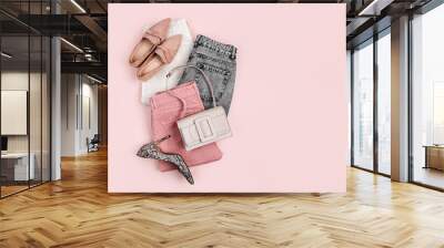 Jeans, handbag and  loafers. Fashion spring, summer or autumn outfit. Women's stylish and elegant clothes with accessory.  Flat lay, top view, overhead. Wall mural