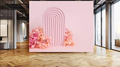 Textured  arch  with flowers on a pink background.  Stylish  background for cosmetic product presentation Wall mural