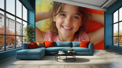 Beautiful girl's emotional face on a plain background. An amazing depiction of innocence and elegance. Wall mural