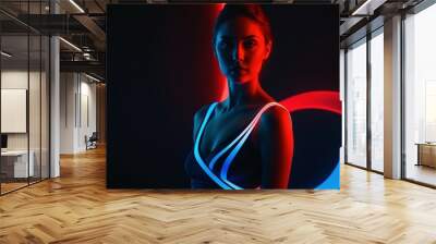 Spectacularly beautiful girl, donning red and blue style. Fashion-forward artwork complements her allure. Wall mural