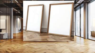 Two empty mock-up poster frames on the floor resting against the wall Wall mural