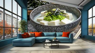   A macro image of two bowls of food on a table with chopsticks next to each other Wall mural