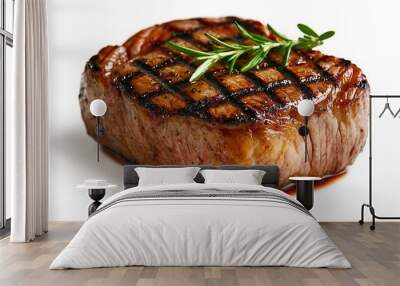   A perfectly grilled steak topped with fragrant rosemary, served on a pristine white plate with a luscious sauce Wall mural