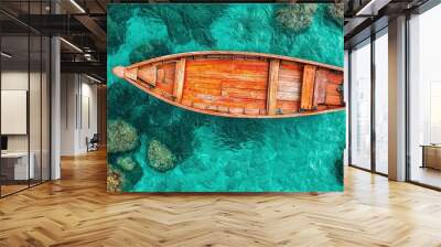  A wooden boat bobbing near rocky shores and a tiny island in the heart of the ocean Wall mural