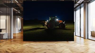  Agricultural tractor with headlights at night Wall mural