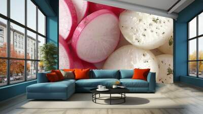   Radishes, sliced and stacked on a white plate Wall mural