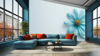 a blue flower with a yellow center on a light blue background with a yellow center on the center of the flower. Wall mural