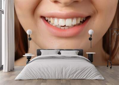 A close-up of a woman's smile with a gap between her two front teeth Wall mural