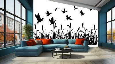 A flock of wild ducks flying over a pond with reeds. Black and white illustration of ducks flying over the river. Vector drawing of a wild bird for the hunter. Wall mural