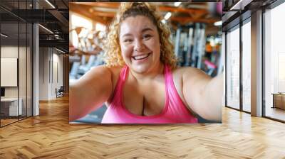 Active lifestyle, loosing weight, healthy habits concept. Happy obese overweight woman making selfie at the gym Wall mural