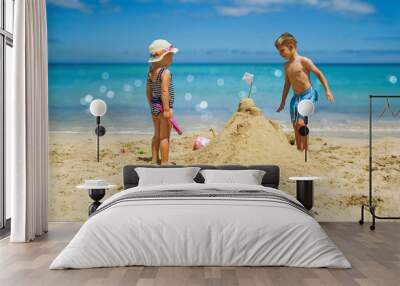 beach vacation in summer by the sea - kids playing at beach Wall mural