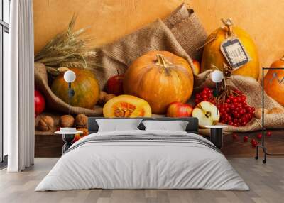 Thanksgiving day: Pumpkins with different decorations Wall mural