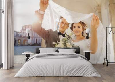 caucasian happy romantic young couple celebrating their marria Wall mural