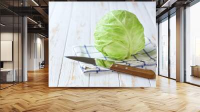 fresh cabbage on a light wooden table, selective focus. Wall mural