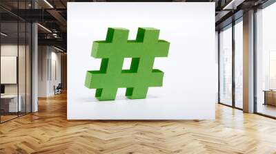 green paper hashtag symbol on white background Wall mural