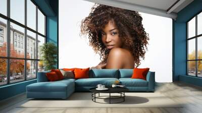  Beautiful black woman . Beauty portrait of african american woman with clean healthy skin on white background. Smiling beautiful afro girl.Curly black hair Wall mural