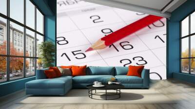 Red pencil over calendar Wall mural