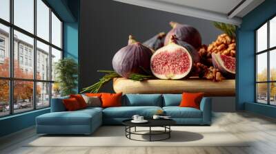 Figs, walnuts, and rosemary on a wooden table. Wall mural