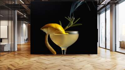 Limoncello garnished with a steaming rosemary branch. Wall mural