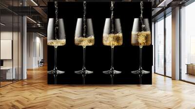 Pouring white wine into a glass on a black background. Wall mural