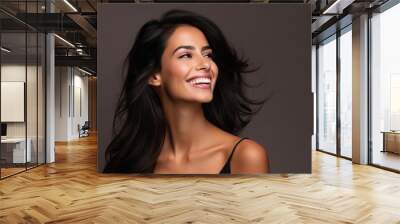 Portrait of a beautiful young happy smiling woman with long black hair Wall mural