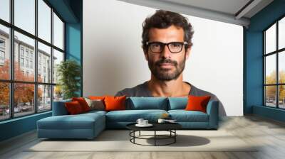 Portrait of handsome bearded man with eyeglasses on white background Wall mural