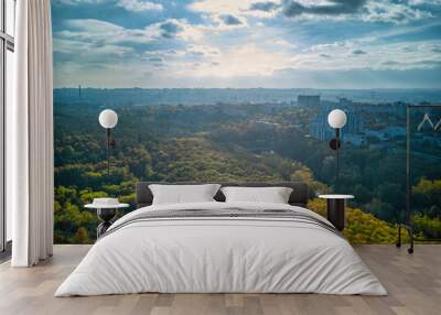 Aerial view of the city at sunset. Beautiful autumn city landscape Wall mural