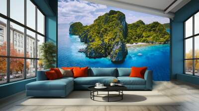 Aerial drone panorama view of tropical paradise island. Karst limestone rocky mountains surrounds by blue ocean and coral reef Wall mural