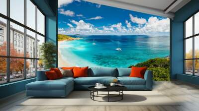 Aerial Pano of Grand Anse beach at La Digue island in Seychelles. White sandy beach with blue ocean lagoon and catamaran yacht moored Wall mural