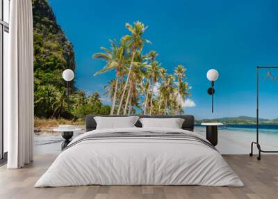 El Nido, Palawan, Philippines. Beautiful Ipil beach with coconut palm trees, sandy beach and blue ocean Wall mural