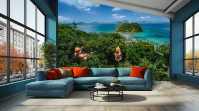 Zipline over Las Cabanas Beach with tourist on sunny day with white clouds over sea. El Nido, Palawan, Philippines Wall mural