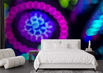 Photo with blur effect in the form of a flower. Multicolored bokeh in the form of a round flower Wall mural