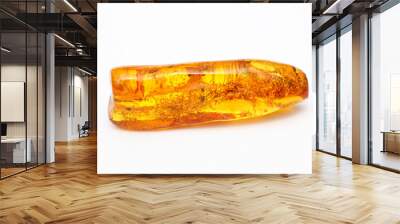 Yellow amber with inclusions on a white background. Natural mineral from ancient petrified resin. Semi-precious color stone for jewelry. Copal. Crystal. Sun stone. Geology. Vintage Wall mural