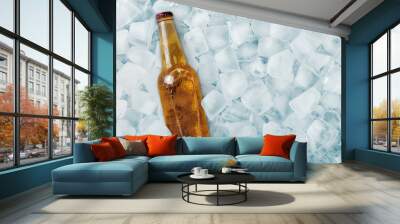 Bottle of cold beer in ice cubes Wall mural