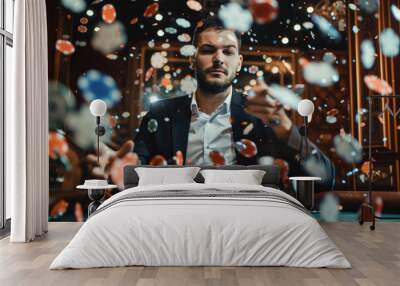 young caucasian man sitting at casino table with many poker chips flying around and drink, white male gambling and winning, looking confident and handsome, gamble establishment concept Wall mural