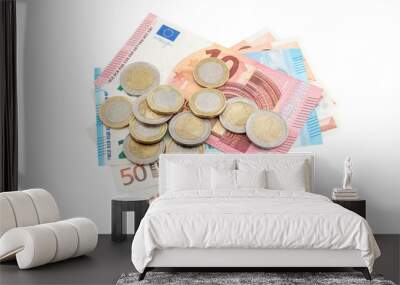 Euro coins with euro bills on white background. Business concept. Wall mural