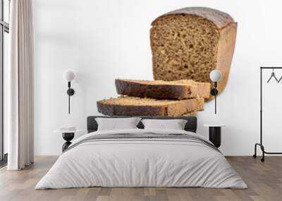 Sliced rye bread on white. Wall mural