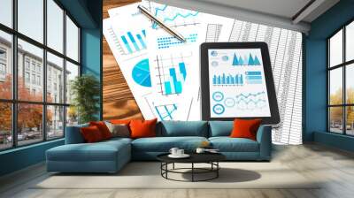 Tablet PC with business  graphs on the documents with financial data. Wall mural