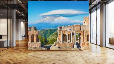 Ancient Greek theatre in Taormina on background of Etna Volcano, Sicily, Italy. Wall mural