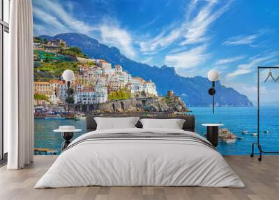 Beautiful Amalfi on hills leading down to coast, comfortable beaches and azure sea on Amalfi Coast in Campania, Italy Wall mural