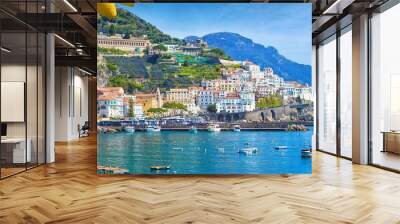 Panoramic view of beautiful Amalfi on hills leading down to coast, Campania, Italy. Amalfi coast is most popular travel and holiday destination in Europe. Wall mural