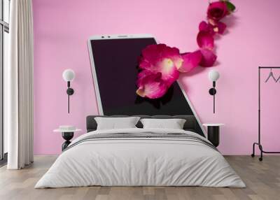 pink rose petals frame with mobile mockup on pink background. top view.
Valentine concept Wall mural