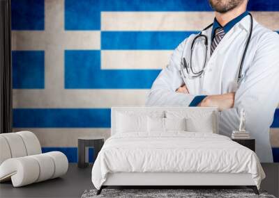 Health and care with flag of greece, Concept of national health of greece. Doctor with stethoscope over greece flag Wall mural