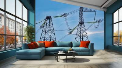 High voltage lines and reliance on a background of blue sky with clouds. Sunny day. Wall mural