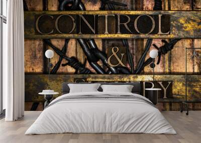 Control and Slavery text over barbed wire and steel chain on vintage textured grunge copper and gold background Wall mural