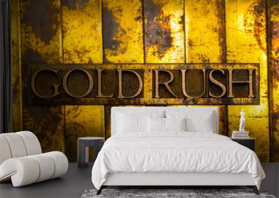 Gold Rush text formed with real authentic typeset letters on vintage textured silver grunge copper and gold background Wall mural