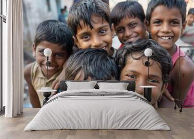 Group of happy indian children smiling and looking at camera. Selective focus. Wall mural