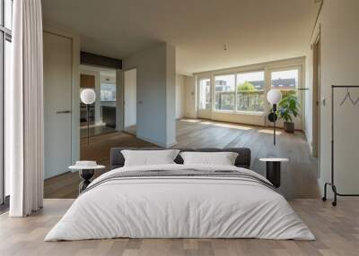 Interior of a new house, empty room with a wooden floor Wall mural