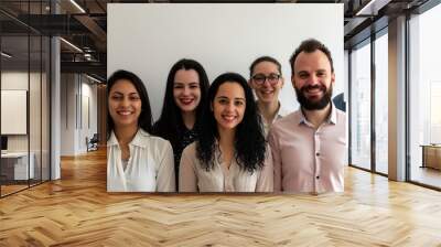 Portrait of a group of business people standing together in a row Wall mural