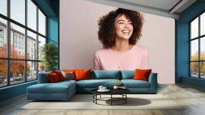 Portrait of beautiful young african american woman with curly hair Wall mural